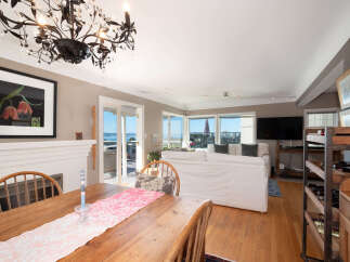 Experience breathtaking ocean views from this stunning living and dining area, perfect for entertaining.