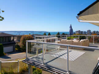 Enjoy breathtaking ocean views from this stunning deck, perfect for entertaining or relaxing.