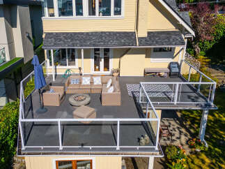 Experience luxurious outdoor living on this expansive deck, perfect for entertaining or relaxing.