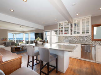 Experience breathtaking ocean views from this stunning open-concept living space, perfect for entertaining.
