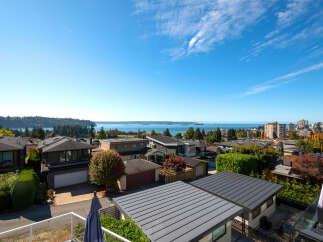 Experience breathtaking panoramic views of the ocean and city skyline from this stunning property.