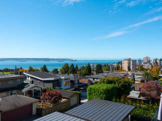 Experience breathtaking panoramic views of the ocean and city skyline from this stunning property.