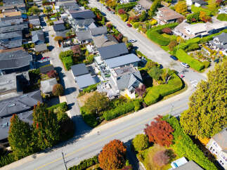 Experience the charm of autumn in this picturesque neighborhood, showcasing a variety of architectural styles from modern to traditional.