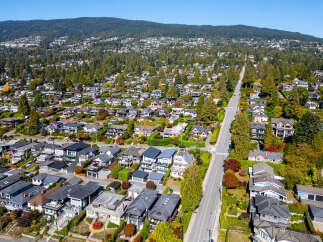 Discover this stunning collection of modern homes nestled amidst lush greenery and rolling hills.