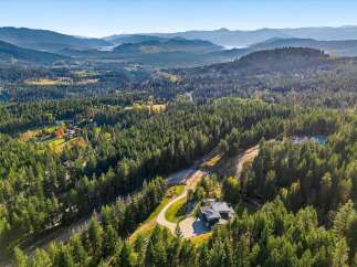 Nestled amidst a lush forest, this stunning property offers unparalleled privacy and breathtaking natural beauty.
