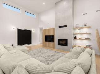 Experience modern luxury in this stunning living room, featuring a dramatic double-height ceiling and a sleek, minimalist fireplace.
