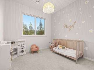 This charming child's bedroom features a cozy crib adorned with soft bedding and a playful doll stroller.