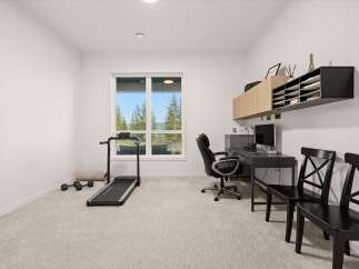 This versatile room offers a perfect blend of fitness and productivity, featuring a treadmill for your workouts and a dedicated workspace with a desk and computer.