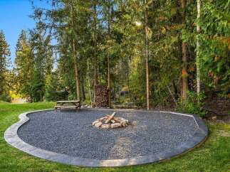 Enjoy the great outdoors with this charming backyard oasis, perfect for gatherings and relaxation.