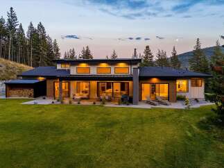Experience modern living in this stunning contemporary home nestled amongst mature trees.