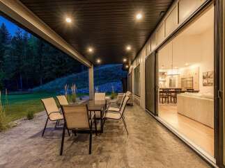 Enjoy seamless indoor-outdoor living with this stunning covered patio, perfect for al fresco dining and entertaining.