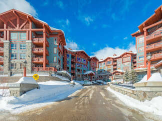 Experience luxury mountain living at Stonebridge, offering stunning ski-in/ski-out access and breathtaking views.