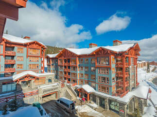 Experience luxury mountain living at Stonebridge, a premier ski-in/ski-out condominium complex offering stunning views and unparalleled access to winter sports.