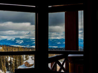 Experience breathtaking mountain views from this stunning property, framed perfectly by large windows.