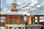 Enjoy breathtaking mountain views from this charming balcony, perfect for a relaxing getaway.