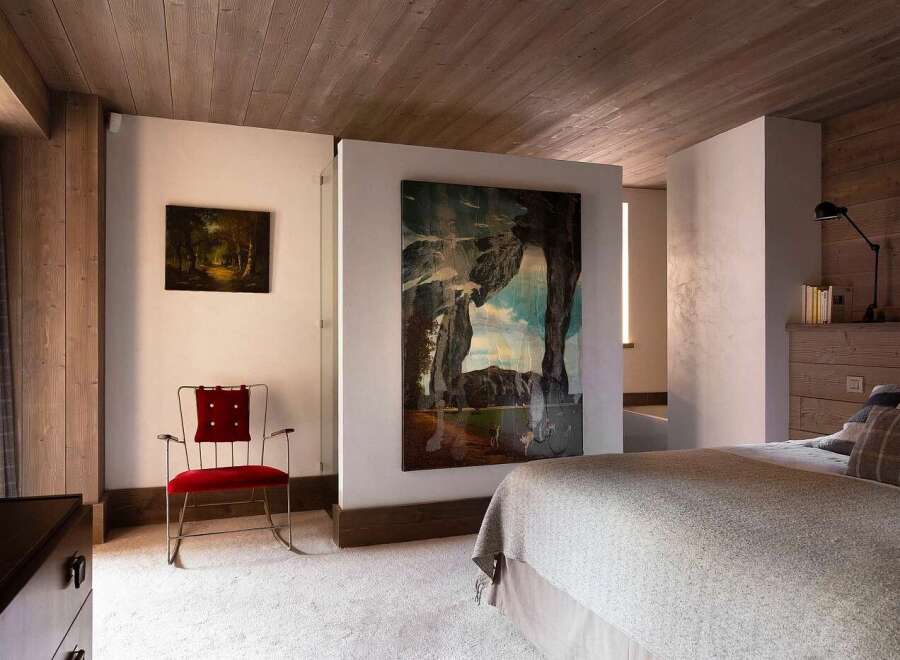 Experience luxury mountain living in this masterfully designed bedroom.