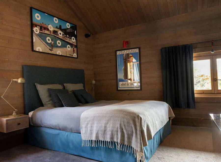 Experience rustic charm and modern comfort in this beautifully appointed bedroom.