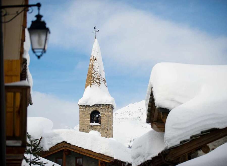 Experience the charm of a winter wonderland with this picturesque scene.