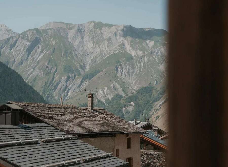 Experience breathtaking mountain views from this charming property nestled in a serene alpine village.