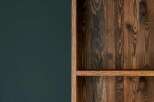 Discover the rustic charm of this home, featuring a beautifully crafted wooden bookshelf that adds warmth and character to any living space.