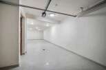 Discover this spacious and well-lit interior space, perfect for a variety of uses.