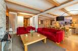 Experience luxury mountain living in this stunning chalet-style living room.