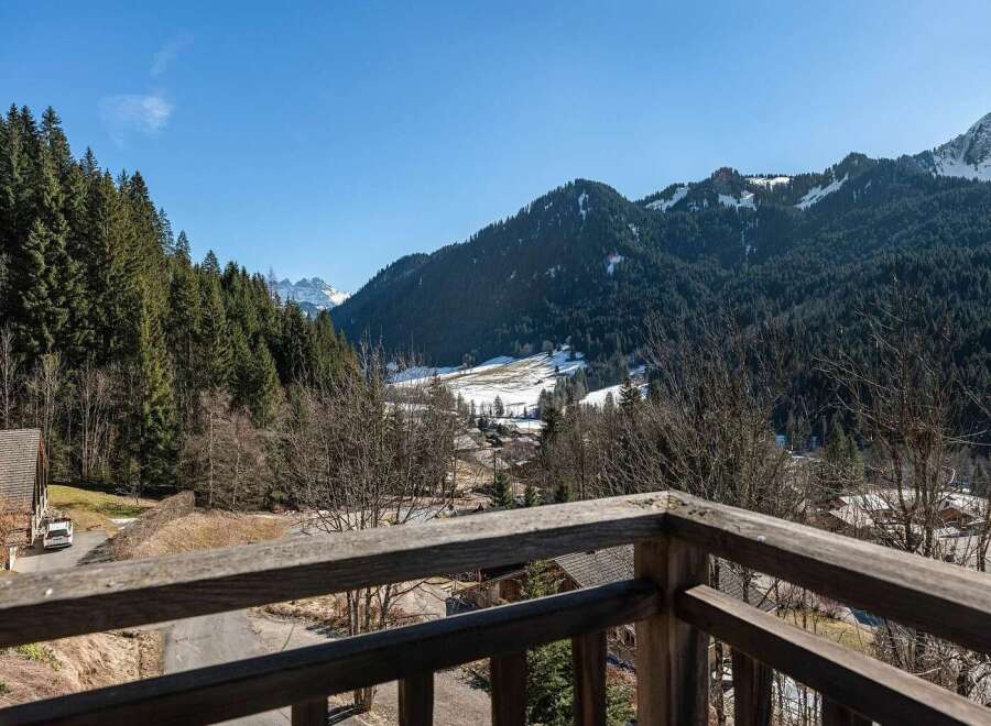 Experience breathtaking mountain views from this charming property, nestled amidst a serene alpine landscape.