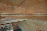 Experience ultimate relaxation in this beautifully crafted wooden sauna.