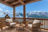 Experience breathtaking mountain views from this charming balcony, perfect for enjoying your morning coffee or evening wine.