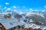 Experience the ultimate alpine lifestyle with this stunning ski-in/ski-out property, offering breathtaking panoramic views of snow-capped mountains and pristine ski slopes.