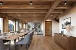 Experience rustic elegance in this stunning mountain lodge dining and living area.