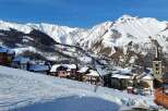 Experience the charm of alpine living in this picturesque ski village, nestled amidst majestic snow-capped mountains.
