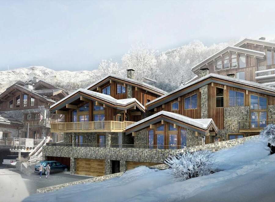 Experience luxury mountain living in this stunning chalet, featuring a harmonious blend of natural stone and warm wood accents.