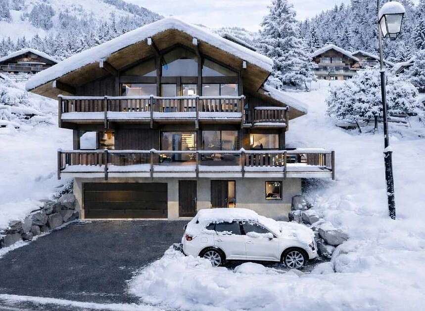 Experience the ultimate winter retreat in this stunning chalet, nestled amidst snow-covered mountains and evergreen forests.