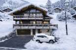 Experience the ultimate winter retreat in this stunning chalet, nestled amidst snow-covered mountains and evergreen forests.