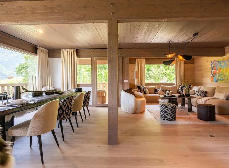 Experience luxurious mountain living in this stunning open-concept dining and living area.
