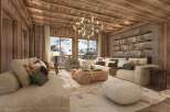 Experience luxurious mountain living in this stunning chalet living room, featuring a rustic wooden ceiling and walls that exude warmth and alpine charm.