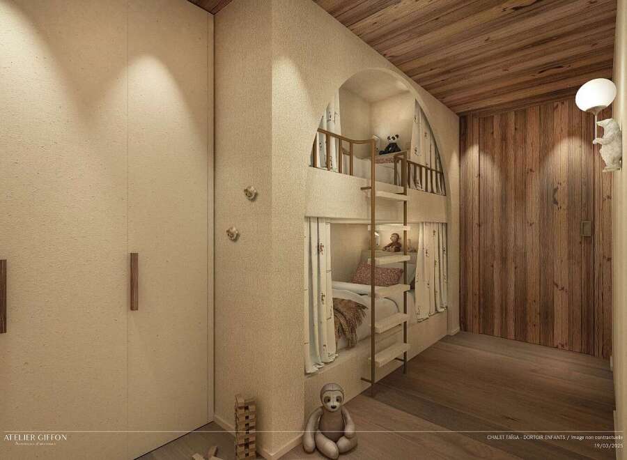This charming children's bedroom features a cozy built-in bunk bed with playful curtains and a ladder for easy access.