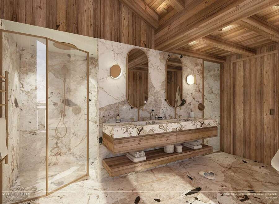 Experience luxury mountain living in this stunning bathroom featuring a spacious walk-in shower with marble walls and a sleek glass enclosure.