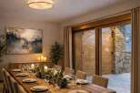 Experience elegant dining in this beautifully set formal dining room, perfect for hosting memorable gatherings.