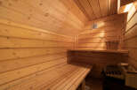 Experience ultimate relaxation in this beautifully crafted wooden sauna.