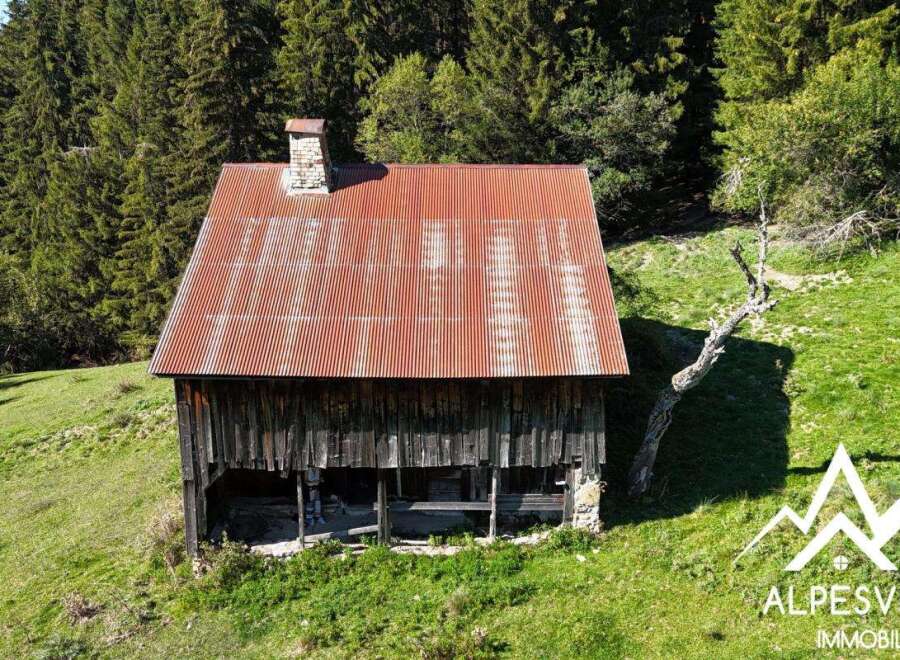 Discover this charming rustic cabin nestled in a serene mountain landscape, perfect for those seeking tranquility and a connection with nature.