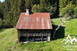 Discover this charming rustic cabin nestled in a serene mountain landscape, perfect for those seeking tranquility and a connection with nature.