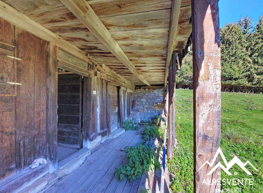 Discover this charming rustic property nestled in a serene natural setting.