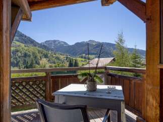 Enjoy breathtaking mountain views from this charming balcony, perfect for morning coffee or evening relaxation.