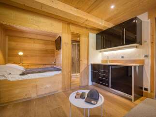 Experience rustic charm and modern convenience in this beautifully appointed studio apartment.