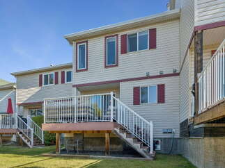 Enjoy outdoor living with this spacious deck, perfect for entertaining or relaxing.