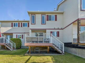 Enjoy outdoor living with this spacious deck, perfect for entertaining or relaxing.