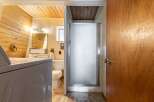 This bathroom features a convenient in-unit washer and dryer, perfect for busy households.