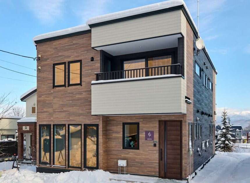 Experience modern living in this stunning multi-story home, perfect for a snowy retreat.